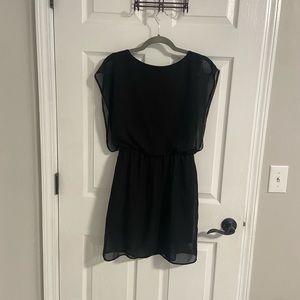 Black Dress with Sheer Overlay and Gold Accents